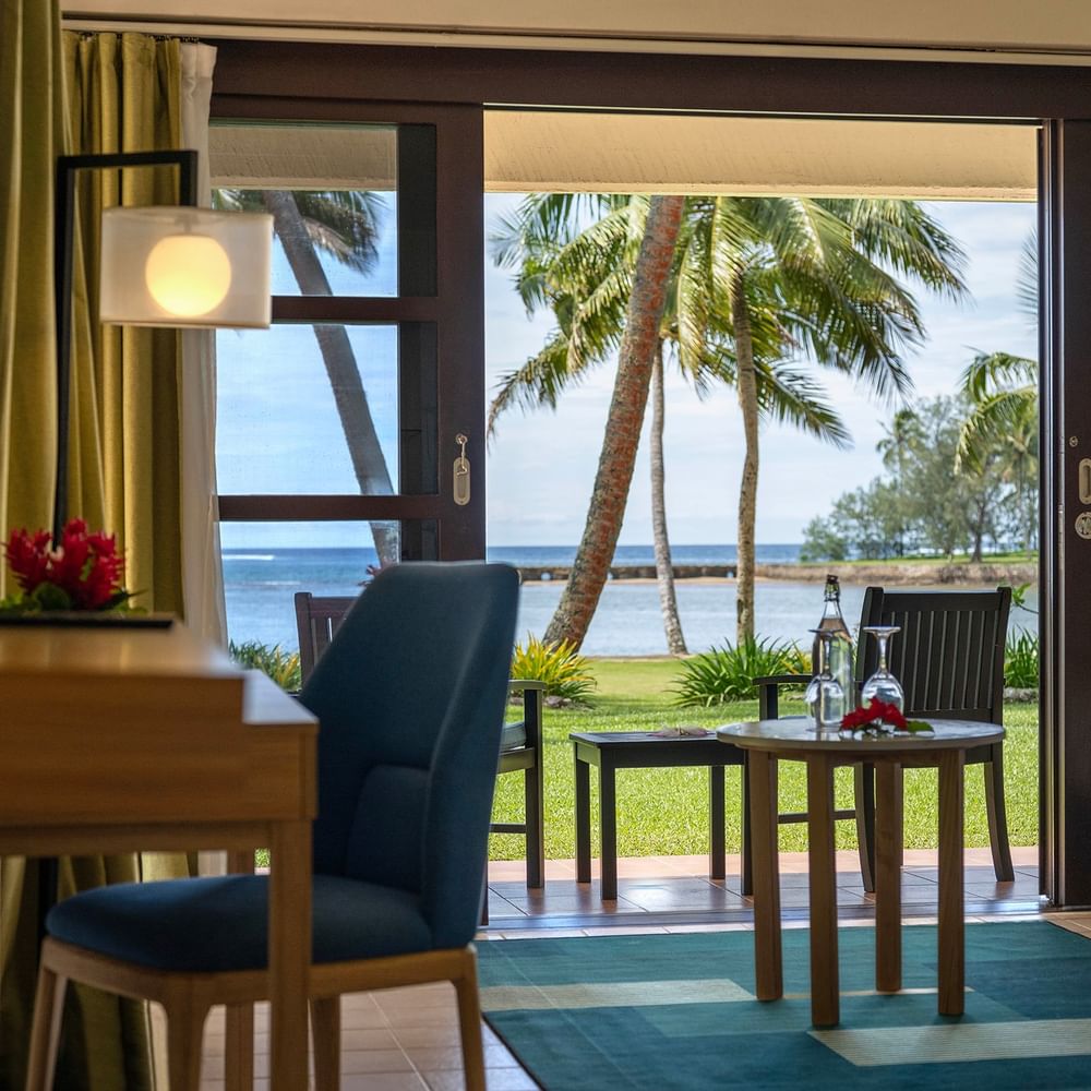 Interior of an Ocean View Room with balcony and ocean view at The Naviti Resort in Korolevu.