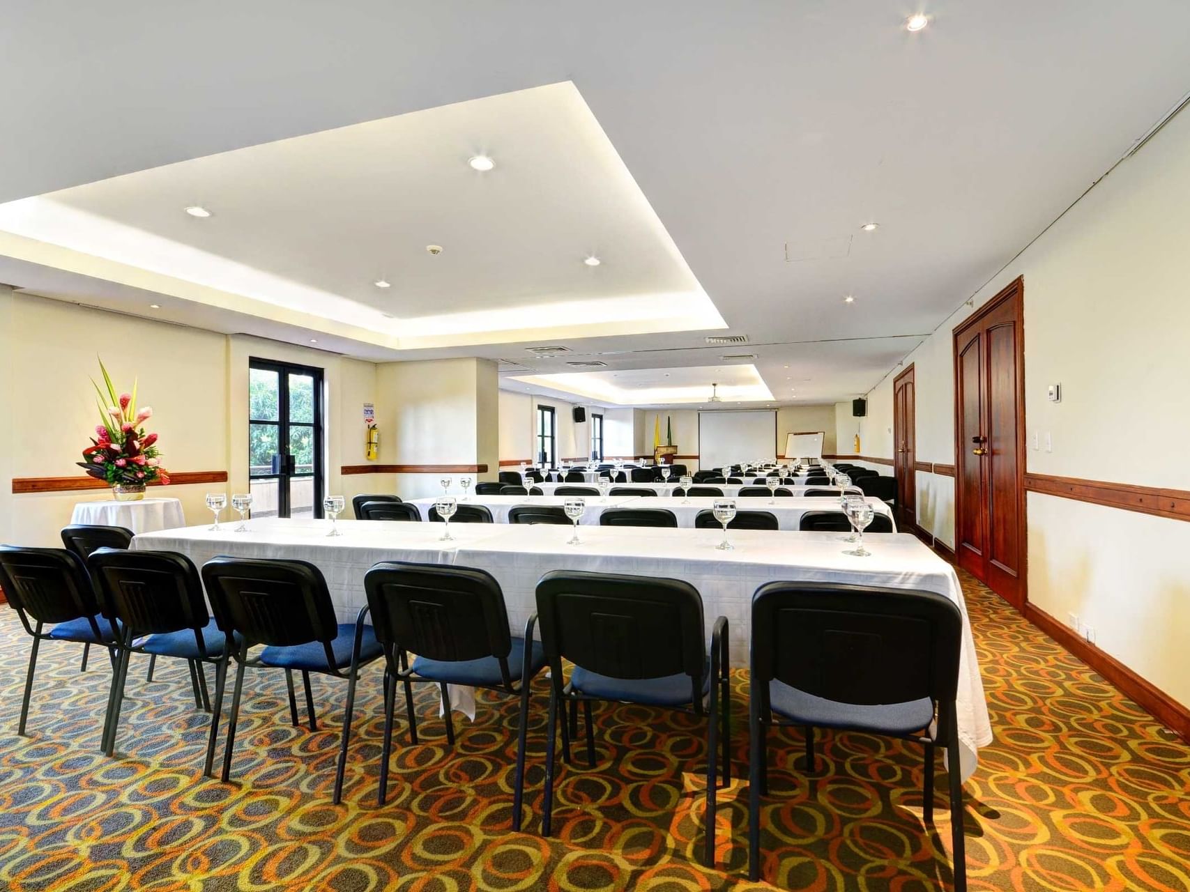 Madeira with classroom table set up at Hotel Dann Carlton Medellin