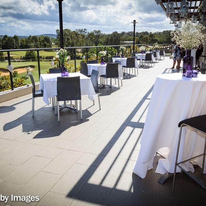 Wedding table arrangement in the balcony of Mercure Kooindah Waters