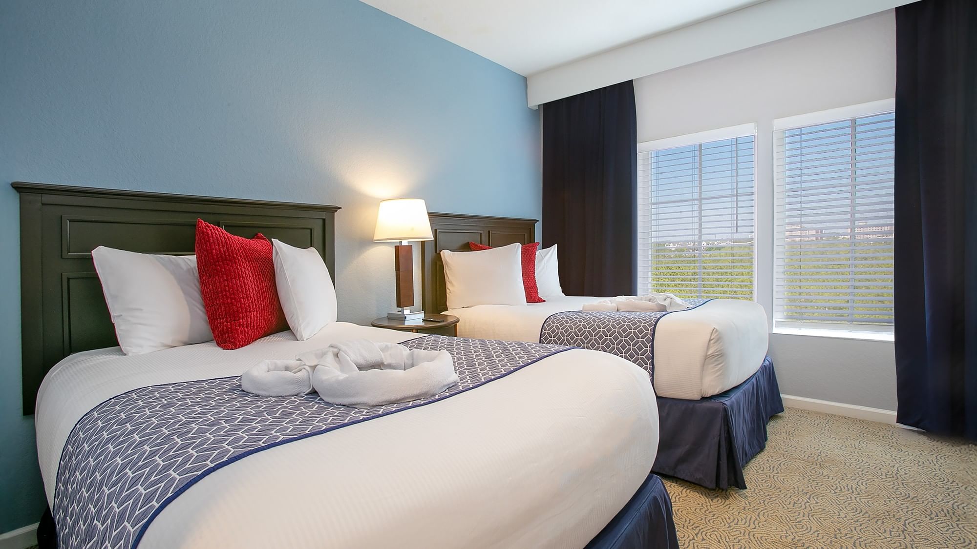 LBV Signature Collection Suites - 3 Bedroom 3 Bath - Third Bedroom with two full beds and carpet flooring