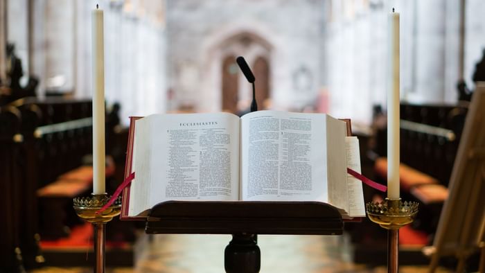 Bible on a podium in Saint-Yves Chapel near Originals Hotels