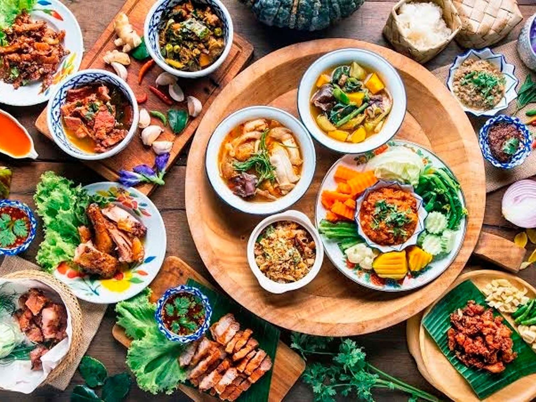 Traditional Thai food on a table in Paradox Phuket Resort