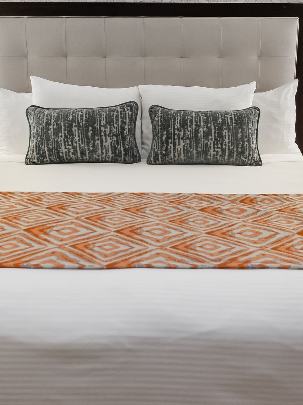 Elegant Premier Room with a king bed and a patterned blanket at Warwick New York
