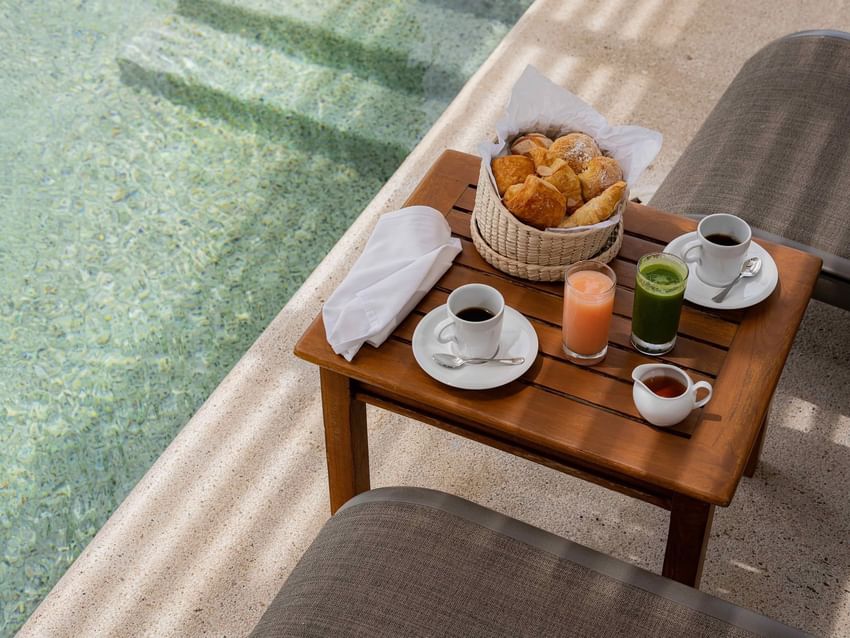 A delicious poolside breakfast with pastries coffee and fresh juices awaits at Marquis Los Cabos Resort a perfect start