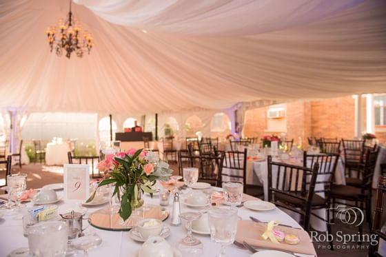 Banquet tables in Outdoor Garden Courtyard at Inn at Saratoga