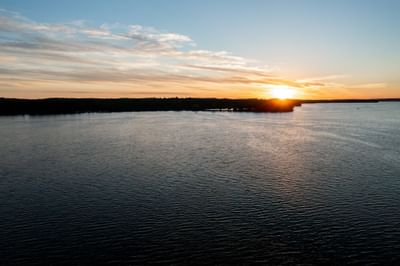 A landscape view of the sunset from the hotel Chase on The Lake