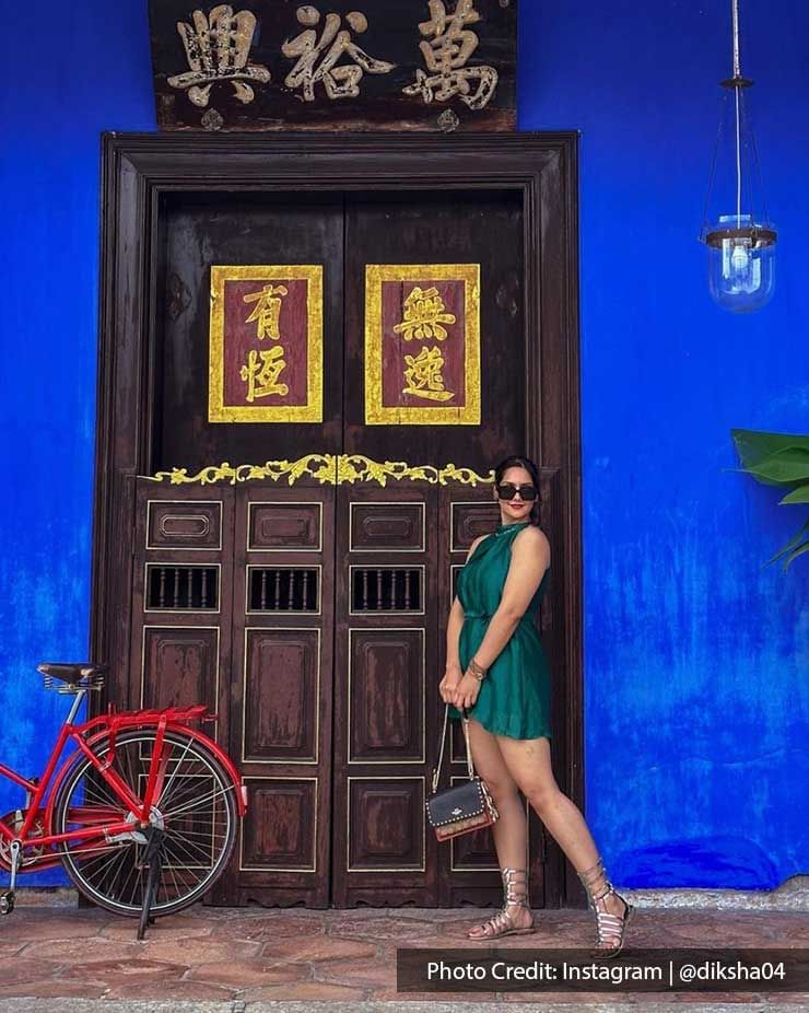 a woman posing for a photo on their holiday