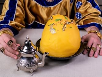 Close-up of golden journey dish in Enigma at Palazzo Versace