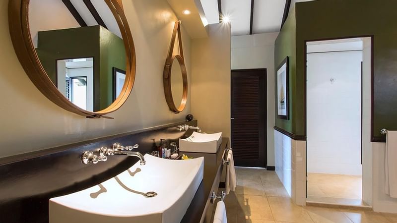 Sink & mirror in Erakor Bathroom at Warwick Le Lagon