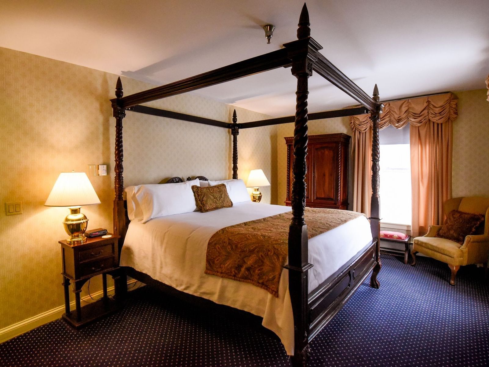 Interior of In House King Suite bedroom at The Inn Saratoga
