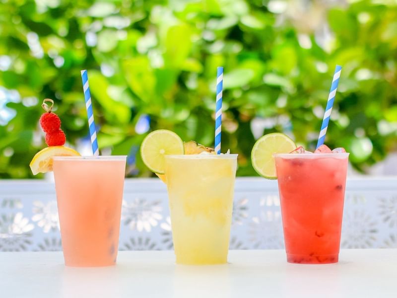 Closeup on three cocktails on a row at Diplomat Beach Resort  