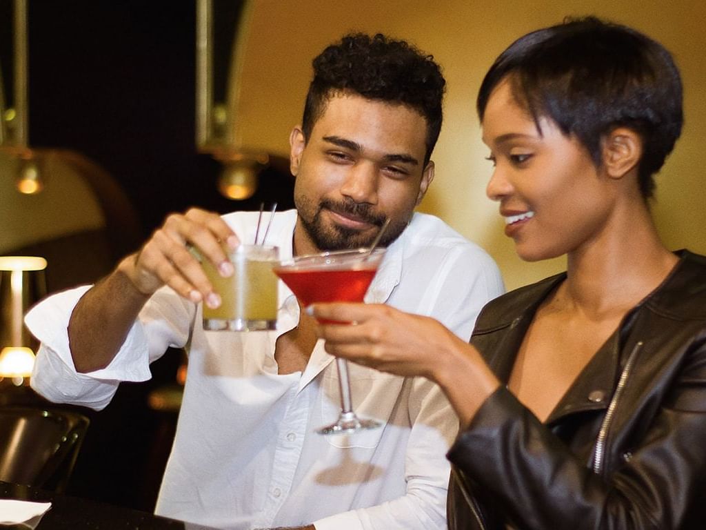 Couple having Cocktails in Regency Bar at Terra Nova All Suite