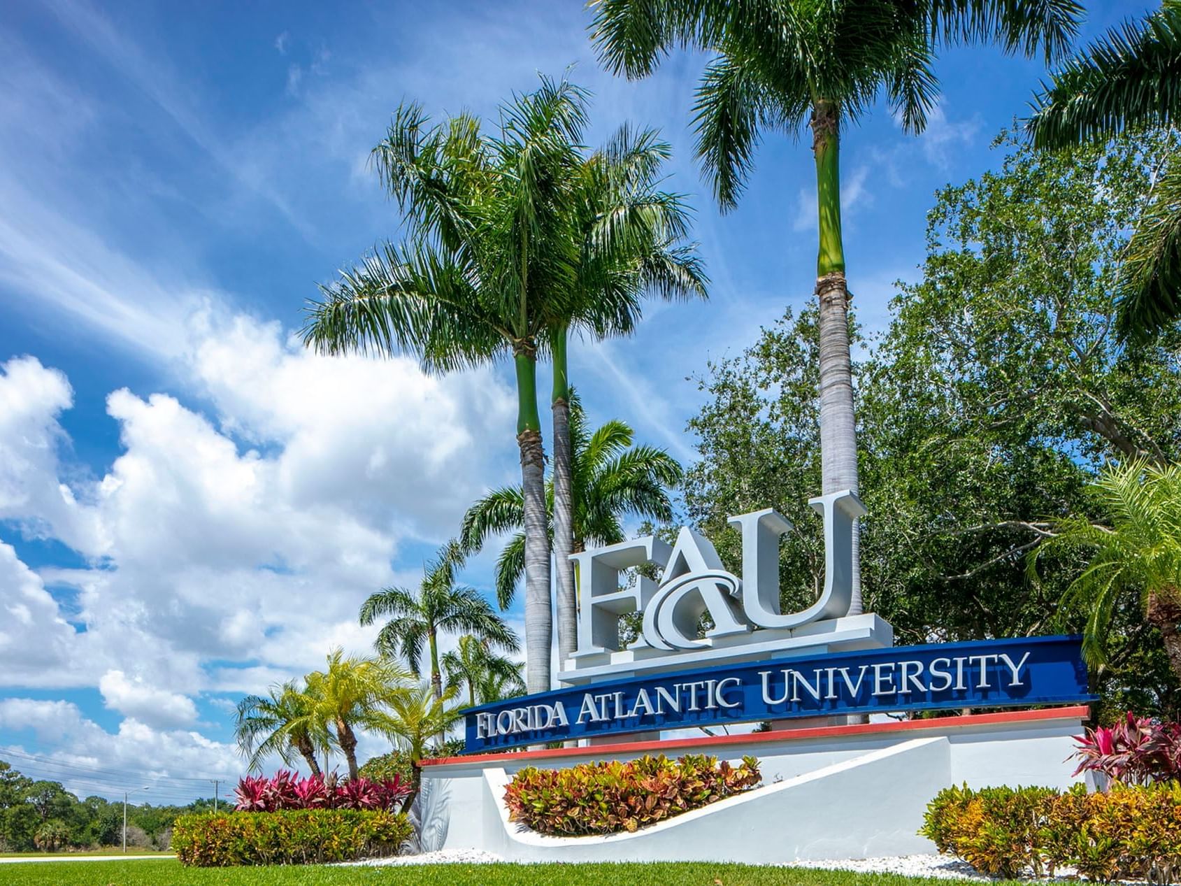 University logo presented by the entrance of Florida Atlantic University near Ocean Lodge Boca Raton