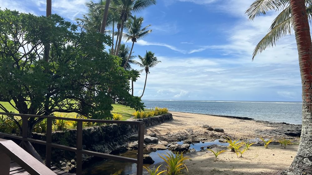 Beachfront walkway leading to the private beach at Tambua Sands Beach Resort in Sigatoka.
