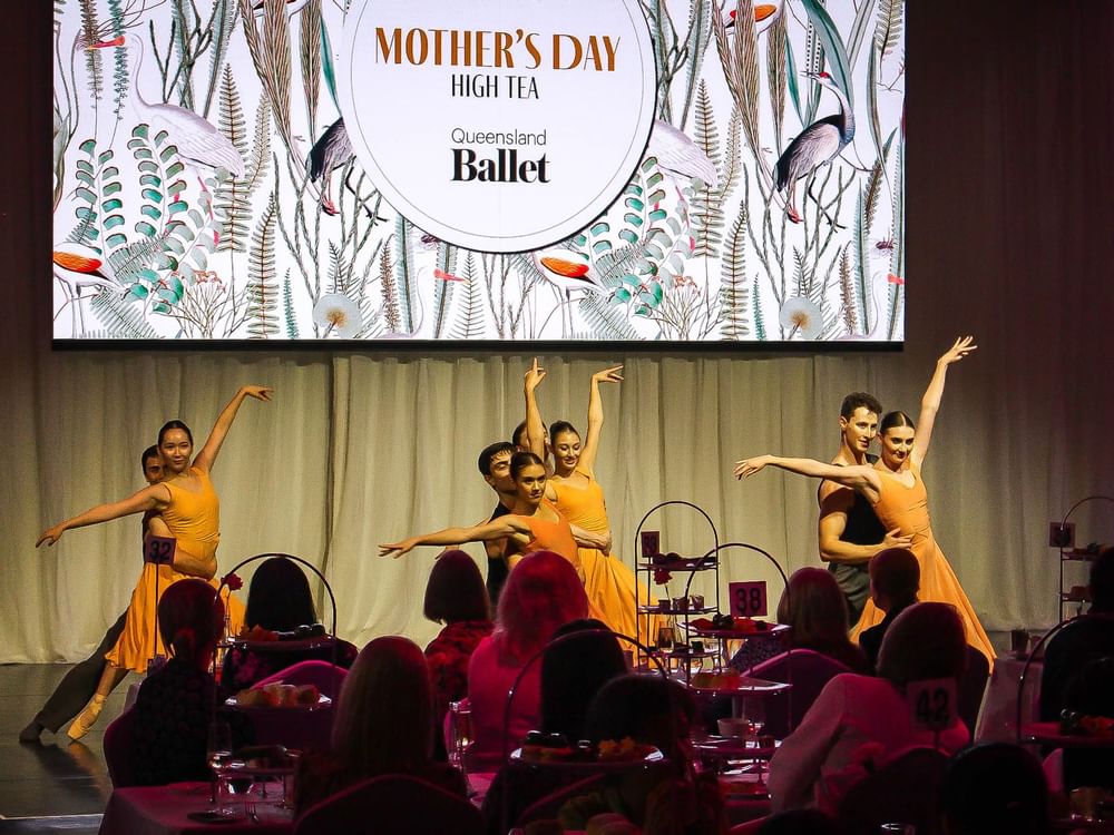 Ballet dancers performing on a stage for an event of Mother's Day High Tea at Sofitel Brisbane Central