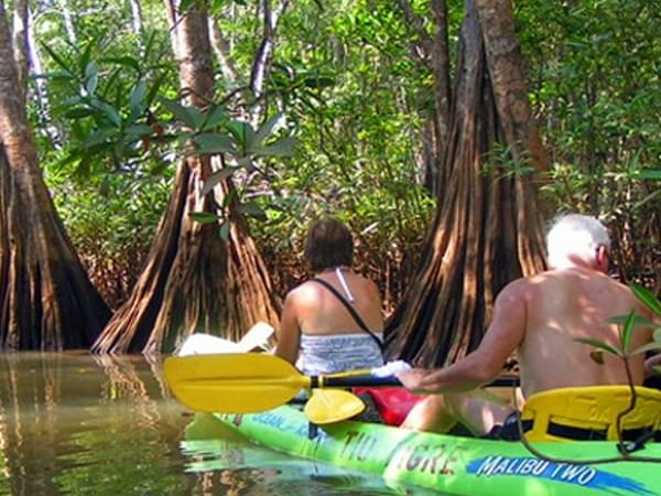 Couple on a Kayaking Adventure near Cala Luna Boutique Hotel