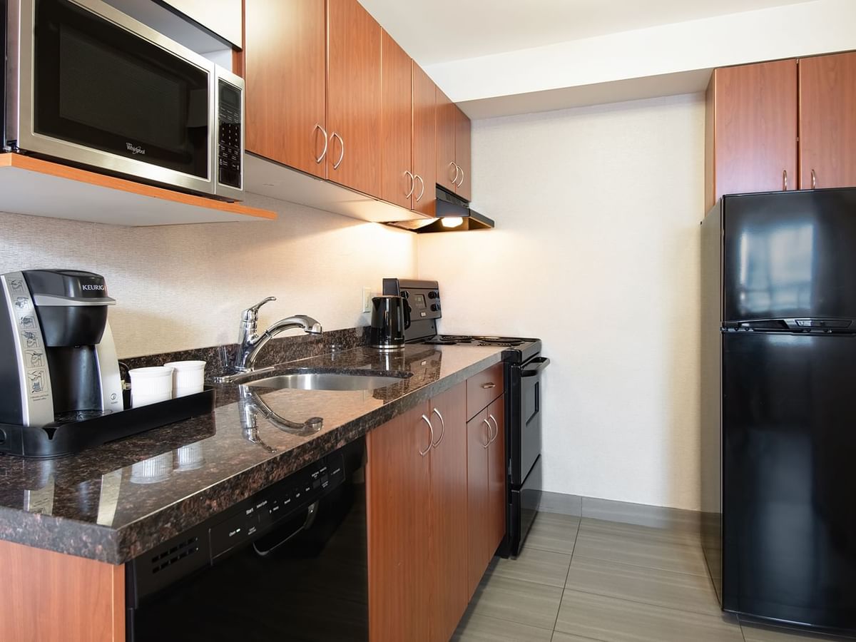 Hotel studio equipped with fridge, microwave, dishwasher and coffee machine