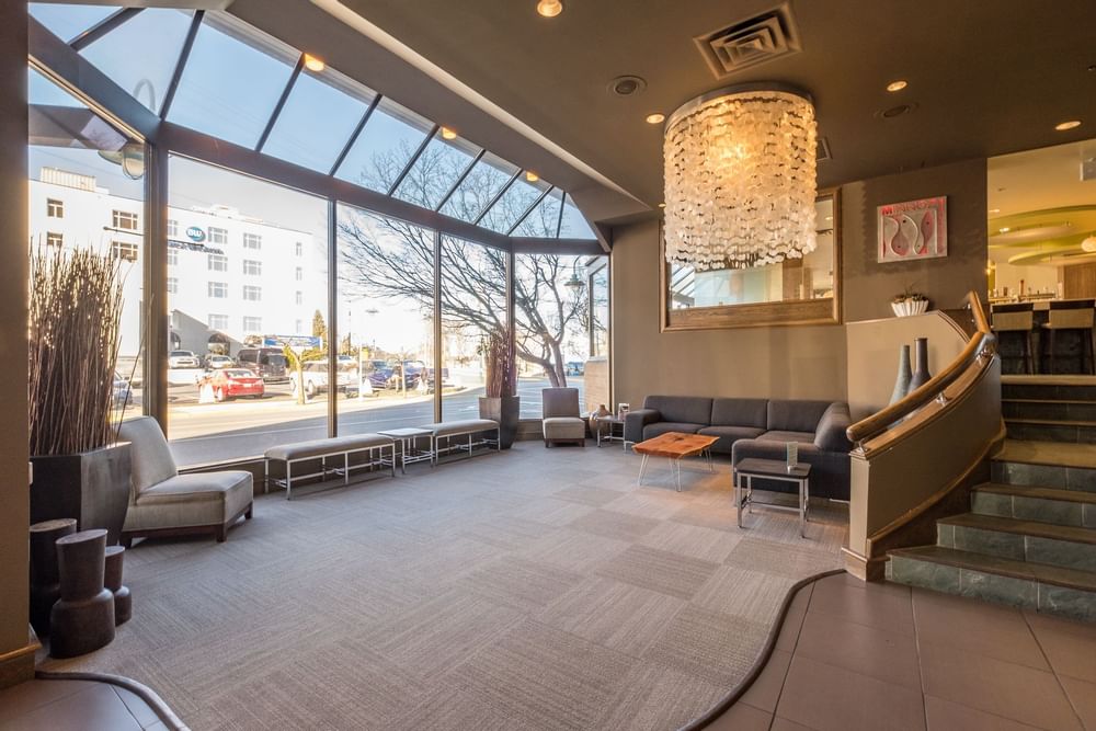 lounge area and stairs in hotel lobby