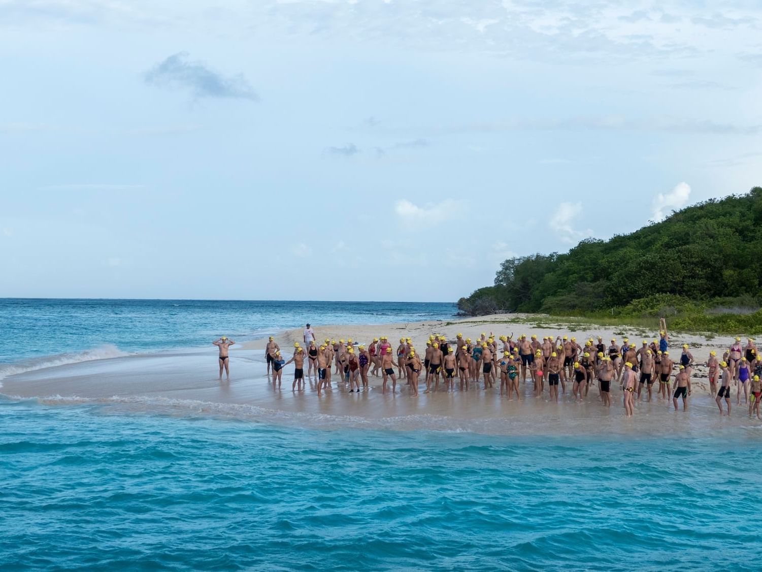 Coral Reef Swim Race swimmers on the beach at Buccaneer Hotel