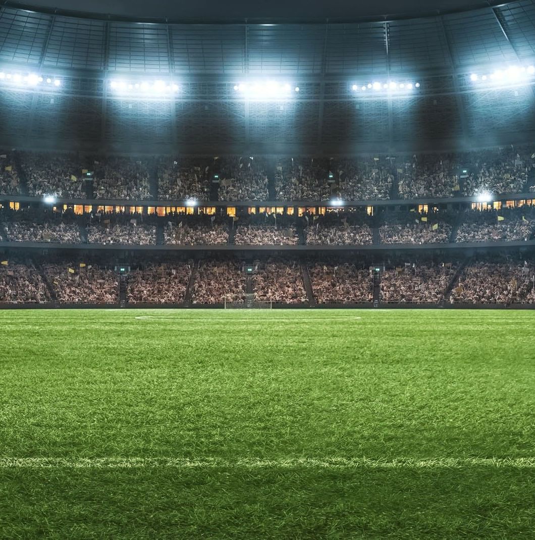 Estadio Azteca football stadium with a lush green field and a crowded grandstand near Camino Real Pedregal Mexico