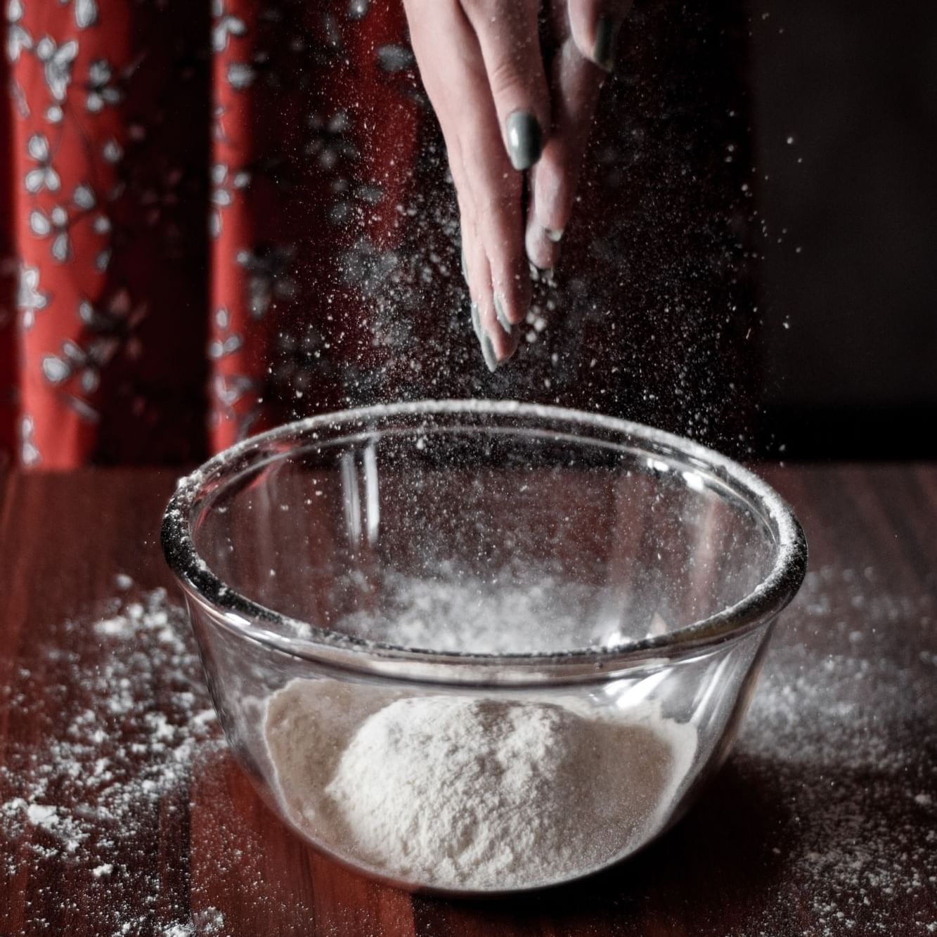 A closeup picture of a flour dough in a bowl