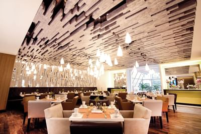 Dining area in Hibiscus Restaurant at Tikal Futura Hotel