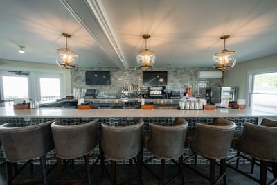bar area with comfy bar stools