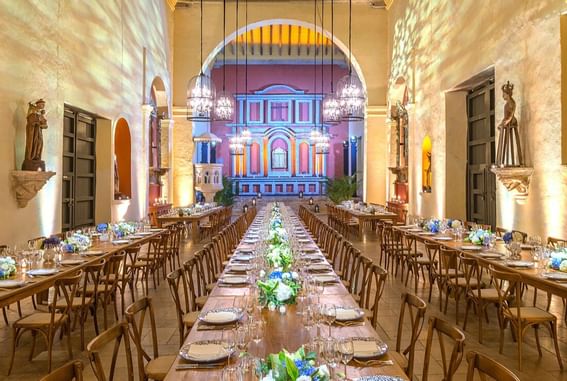 Long dining table set up in an event room at Hotel Charleston