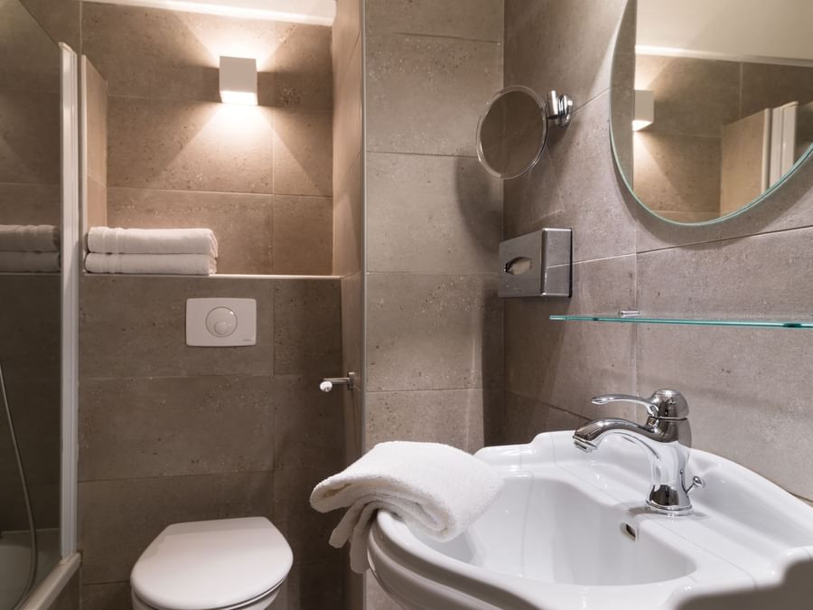 Bathroom vanity in bedrooms at Hotel du Parc
