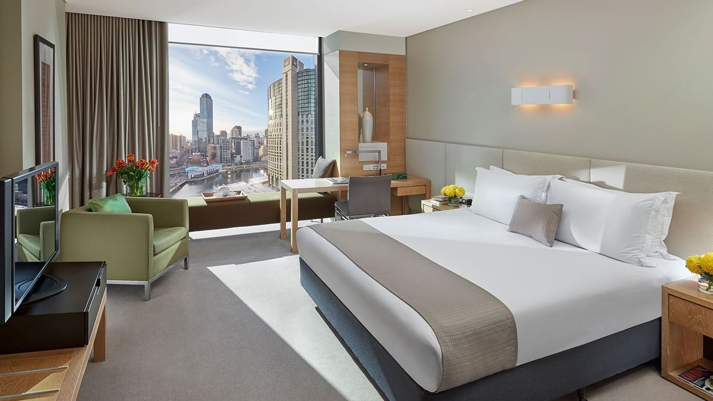 Bed & furniture in Premier King Room at Crown Hotel Melbourne