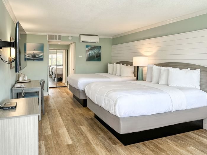 Bedroom in Poolside Efficiency Room at Thunderbird Beach Resort