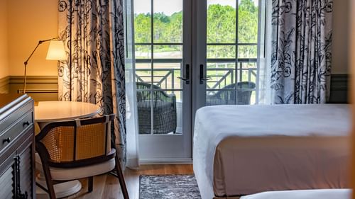 Work table by the window in Golf View Queen Room With Balcony at Camp Creek Inn