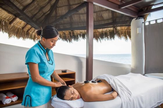 A lady getting massage at  Buenaventura Grand