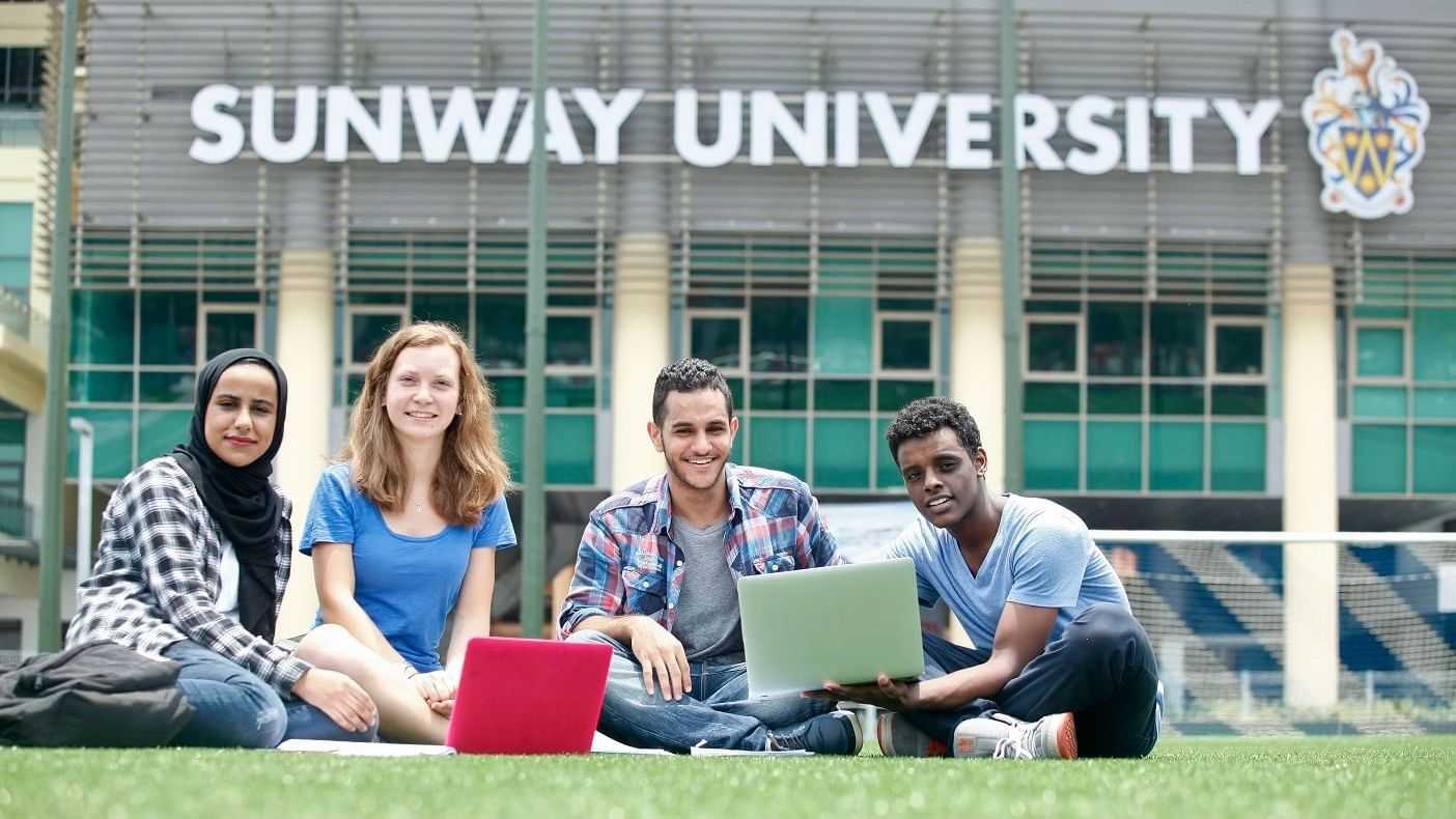 Four students in front of Sunway University near Sunway Lagoon