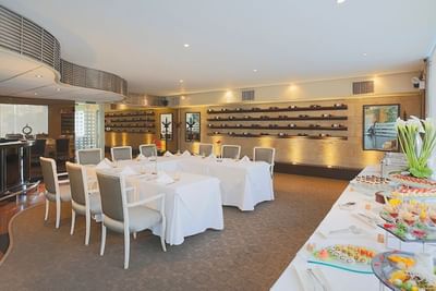 Buffet area with U-shaped dining table set-up in Oceanus Wine Bar & Restaurant at Hotel Los Delfines & Casino