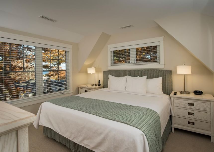 Cozy double bed with city view at Juniper Hill Inn by Ogunquit Collection