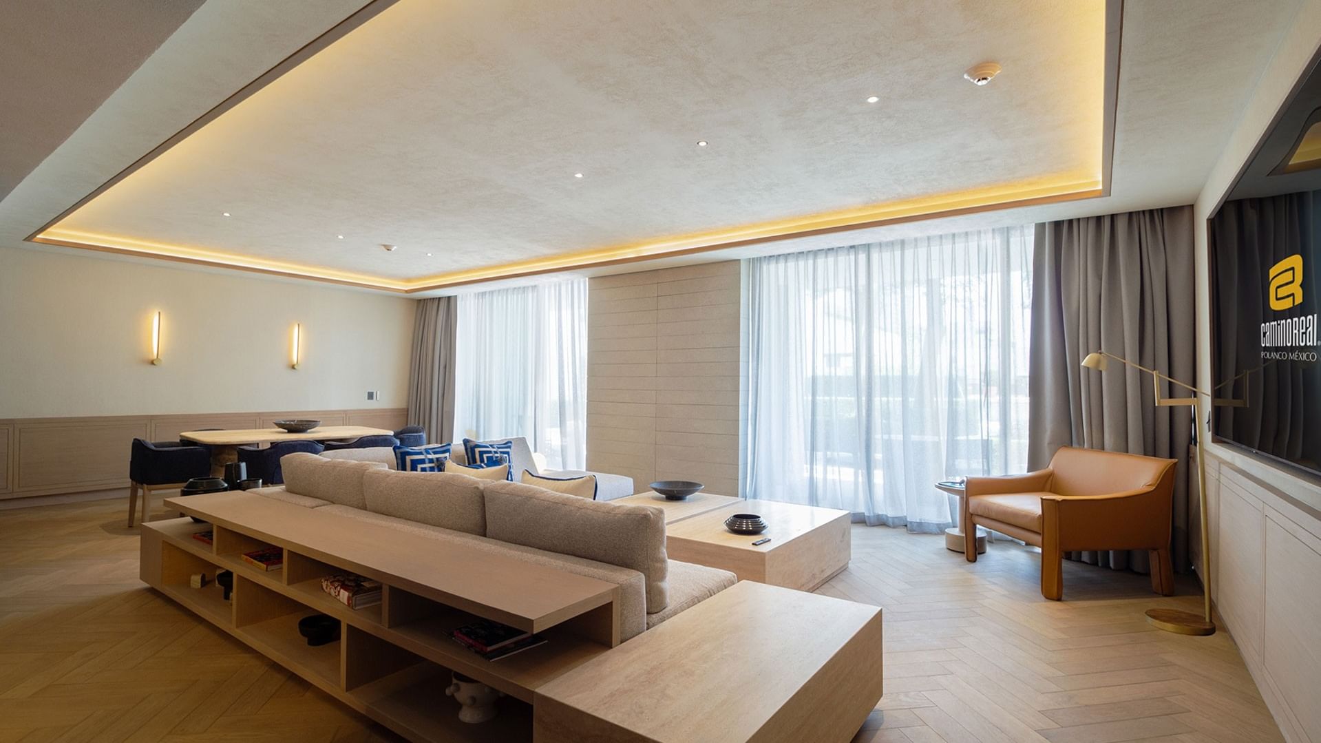 King Superior Viceroys Suite with recessed ceiling lighting and neutral wood tones at Camino Real Polanco Mexico