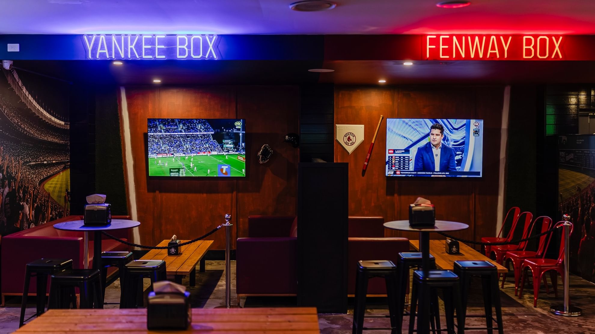 Lively KG Sport Bar area featuring multiple screens and neon signs at Mercure Brisbane King George Square