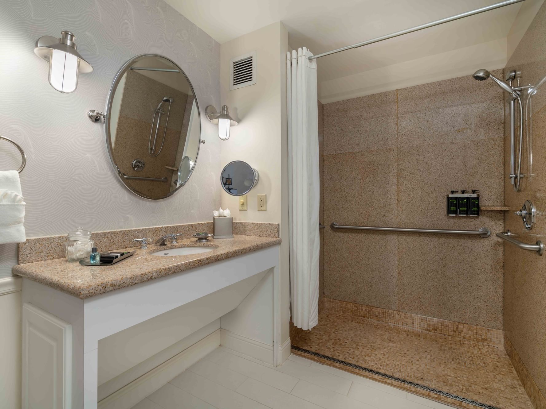 Bathroom with vanity & shower area in Accessible King Rooms at Portland Harbor Hotel