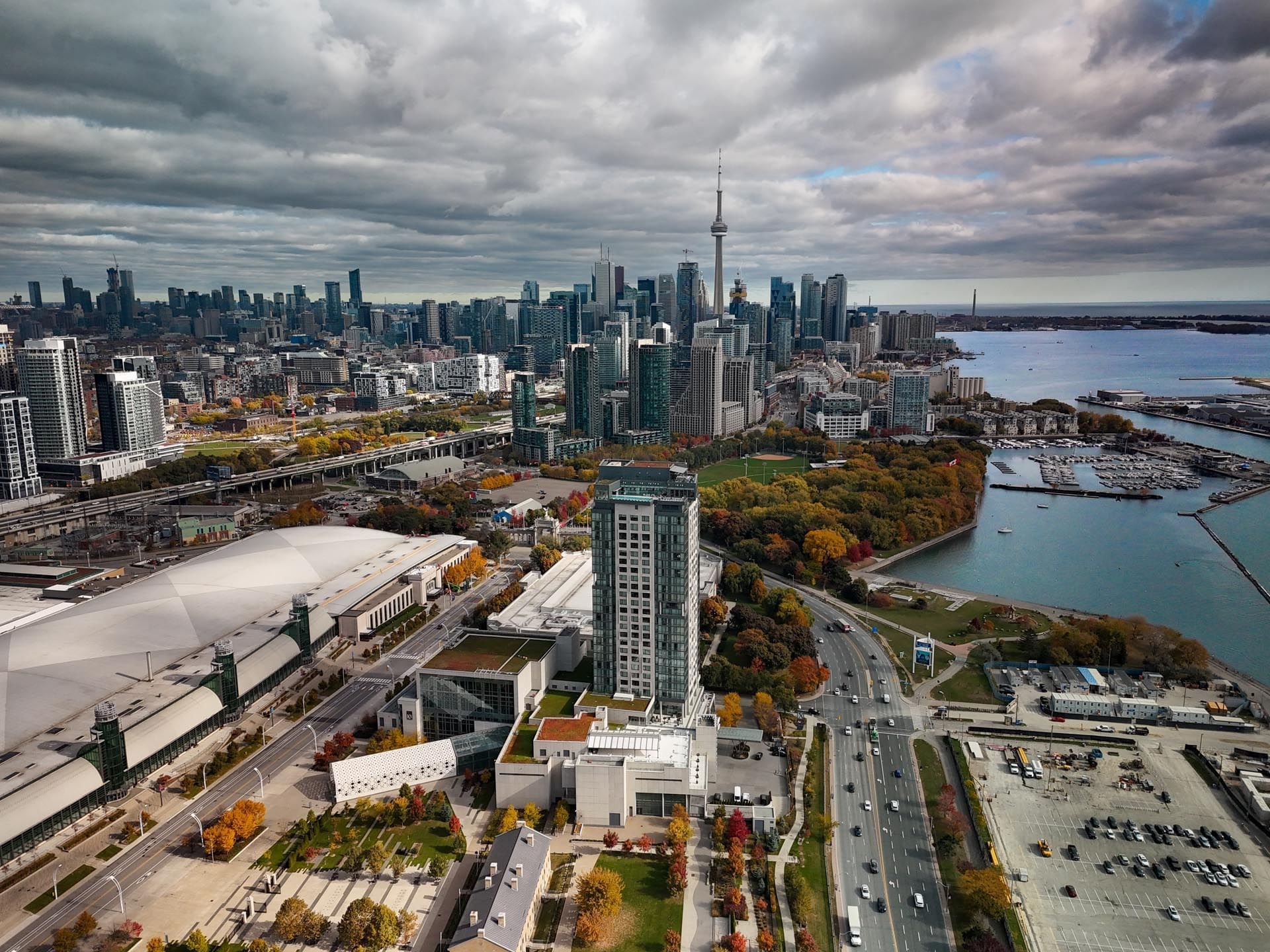 Aerial view of Hotel X Toronto near waterfront with autumn trees