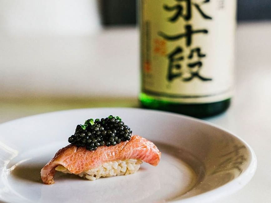 Salmon & sake served in Saishin at Gansevoort Meatpacking NYC