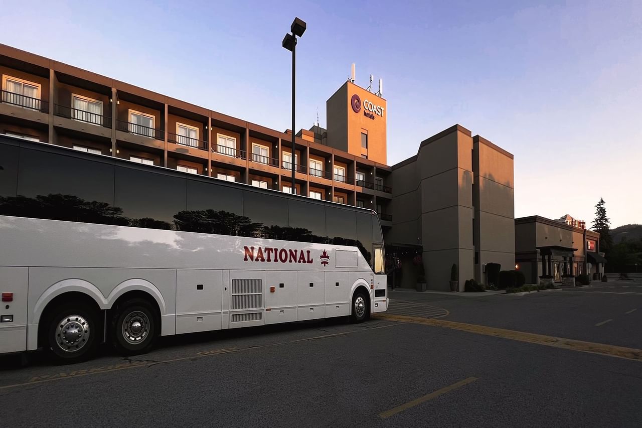 Bus parked outside hotel
