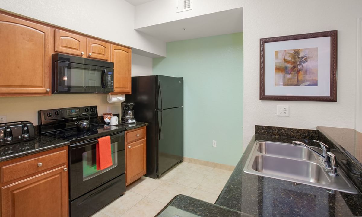 Interior view of a kitchen area at Lake Buena Vista Resort Village & Spa