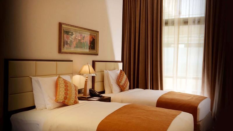 Interior & decor featuring double beds in Superior Twin Room at Warwick Al Khobar