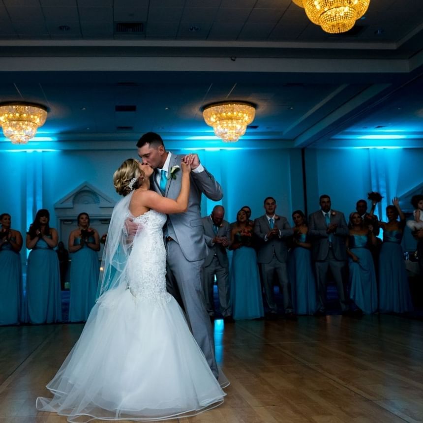 Wedding couple on the dancing floor at Ocean Place Resort & Spa