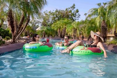 Adults floating in lazy river