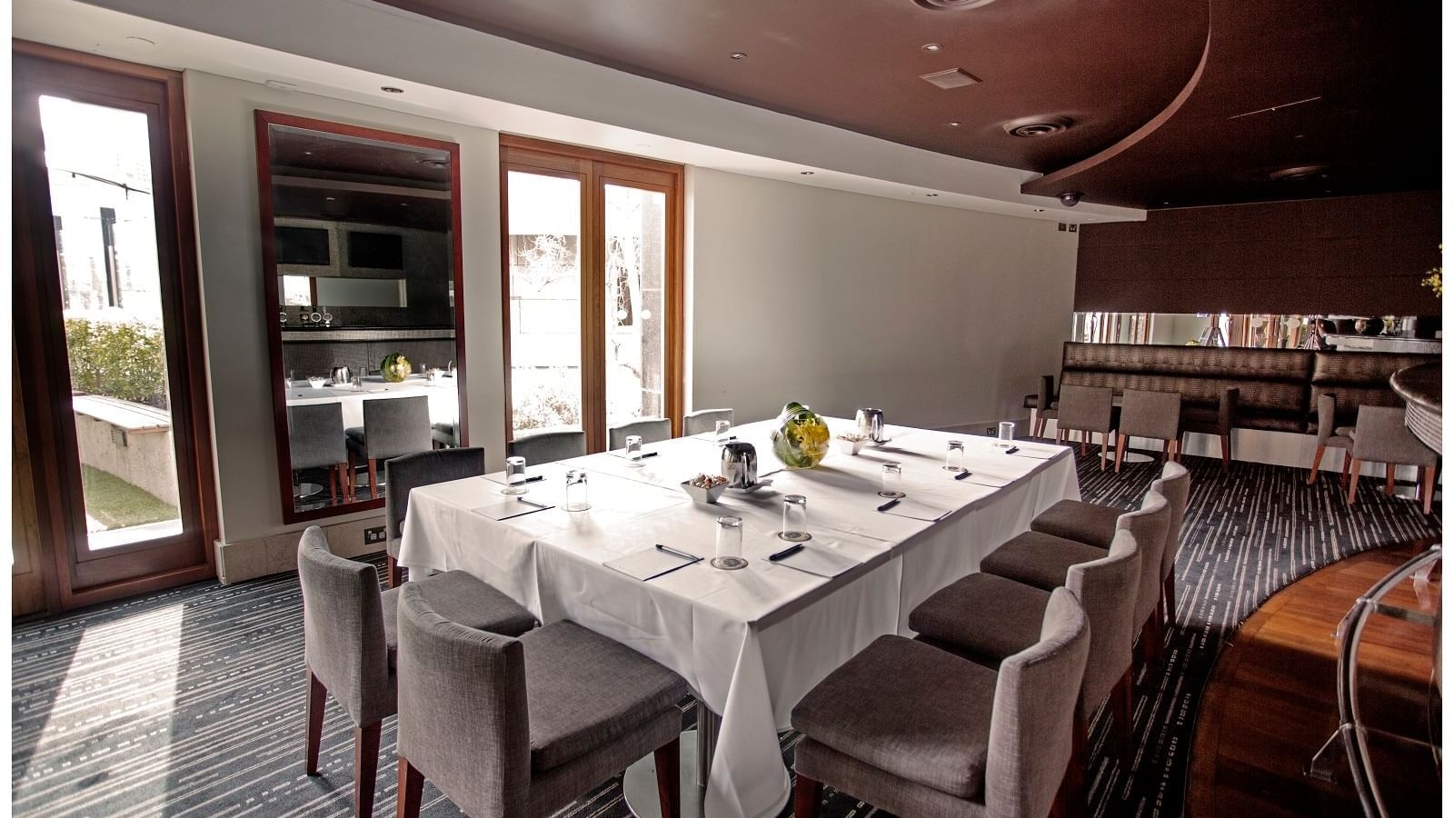 Dining table in Jarrah Bar & Terrace at Quay West Suites Melbourne