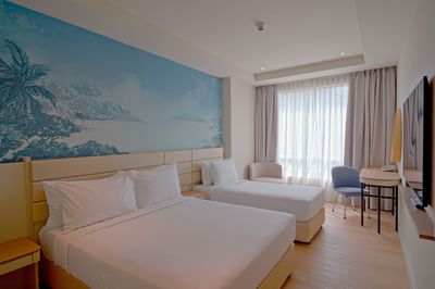 TV & work desk by the beds in Superior Triple at Cititel Express Kota Kinabalu