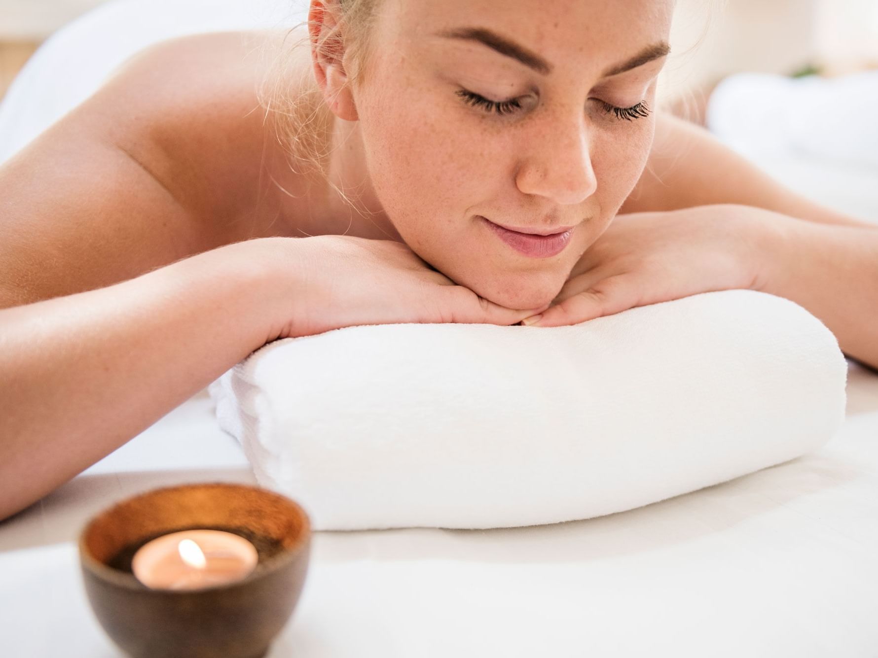 A woman relaxing after a massage in the Spa at Peaks Resort
