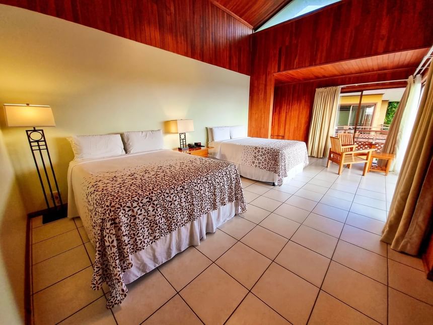 Interior of Deluxe Room with beds at Ficus Lodge